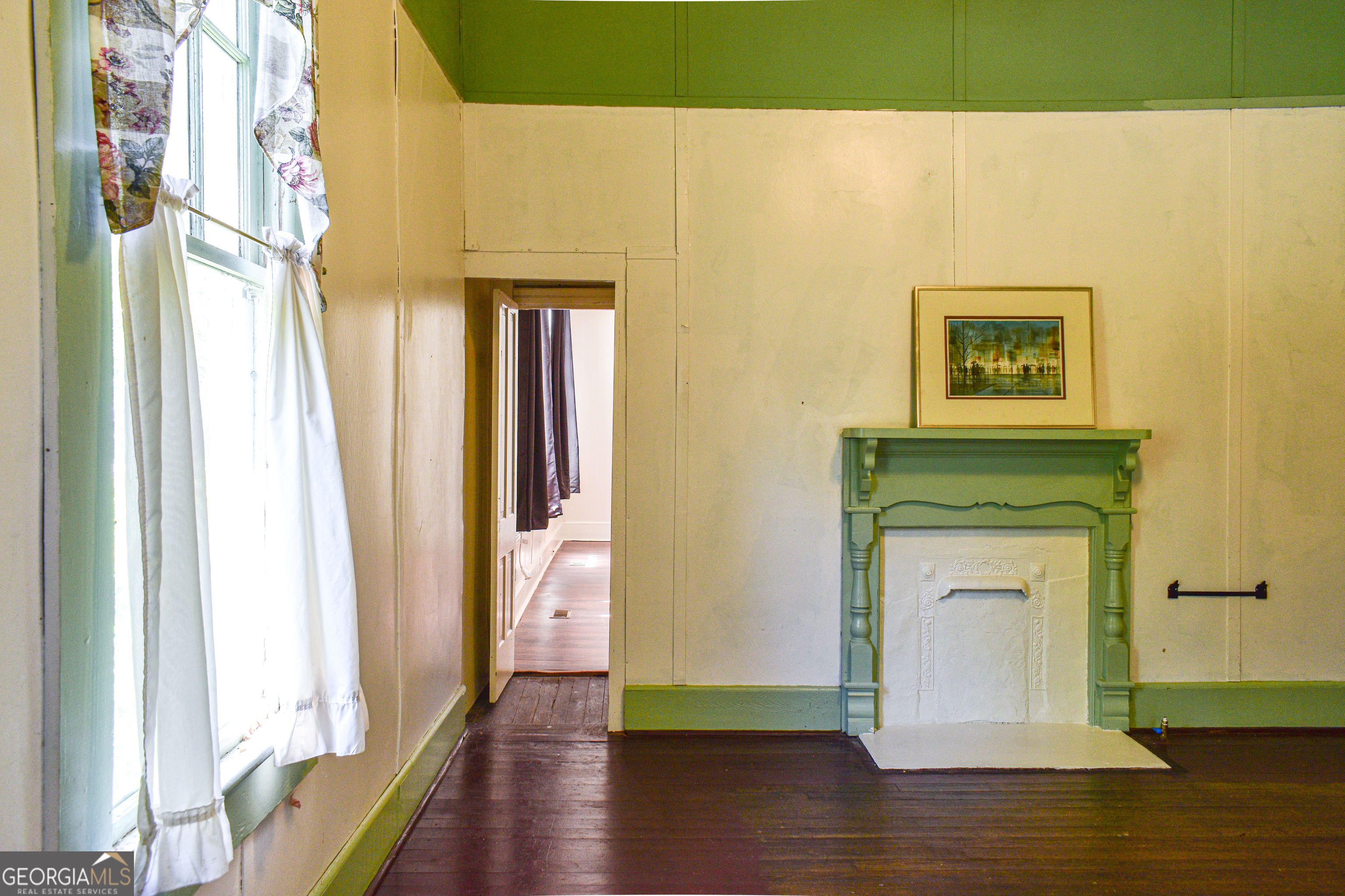 100 Minor Avenue Montezuma, GA 31063 - Photo 25 of 43 a view of an entryway door with wooden floor