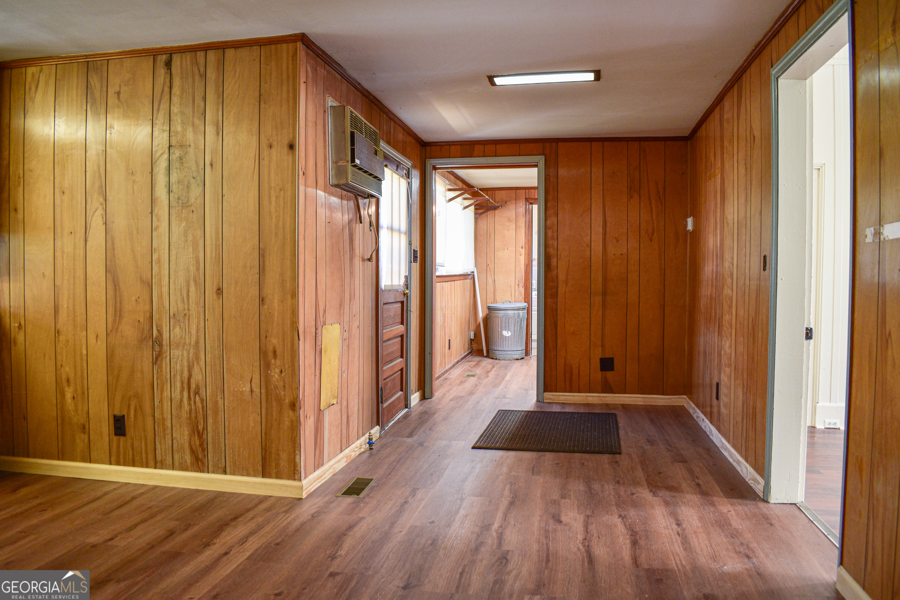 100 Minor Avenue Montezuma, GA 31063 - Photo 31 of 43 a view of a hallway with wooden floor