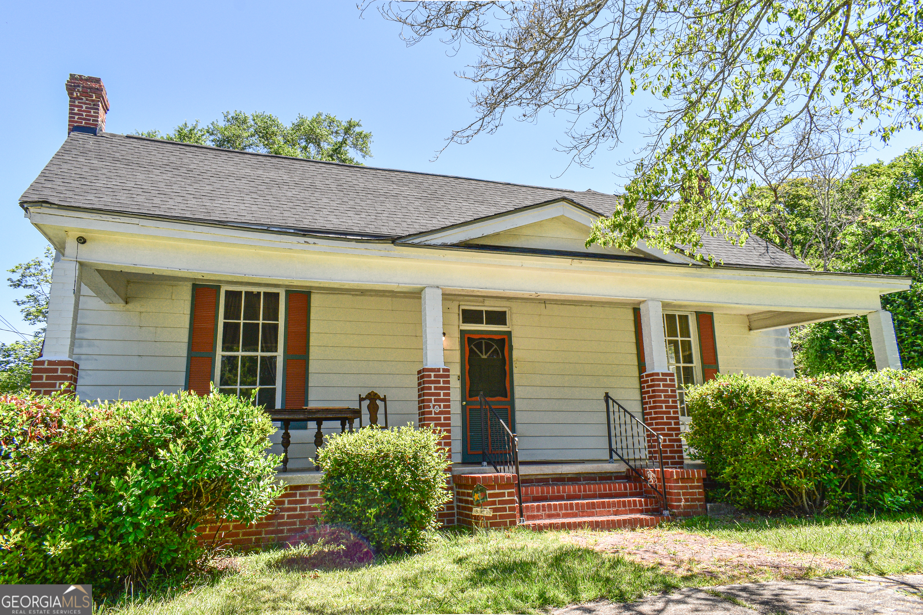 100 Minor Avenue Montezuma, GA 31063 - Photo 43 of 43 a front view of a house with garden