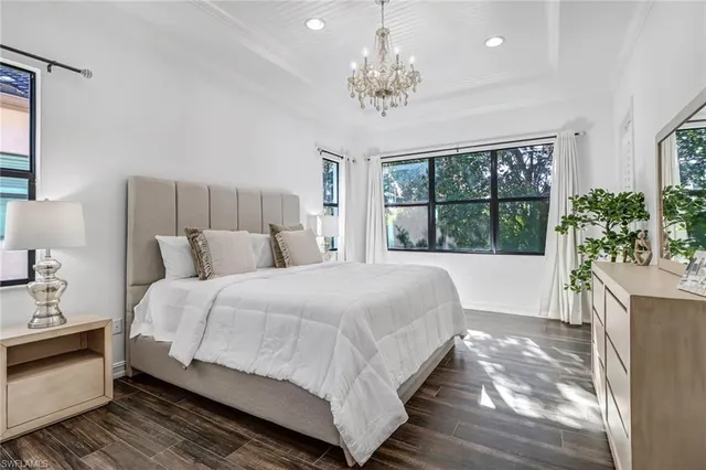 a view of a dining room with furniture and window
