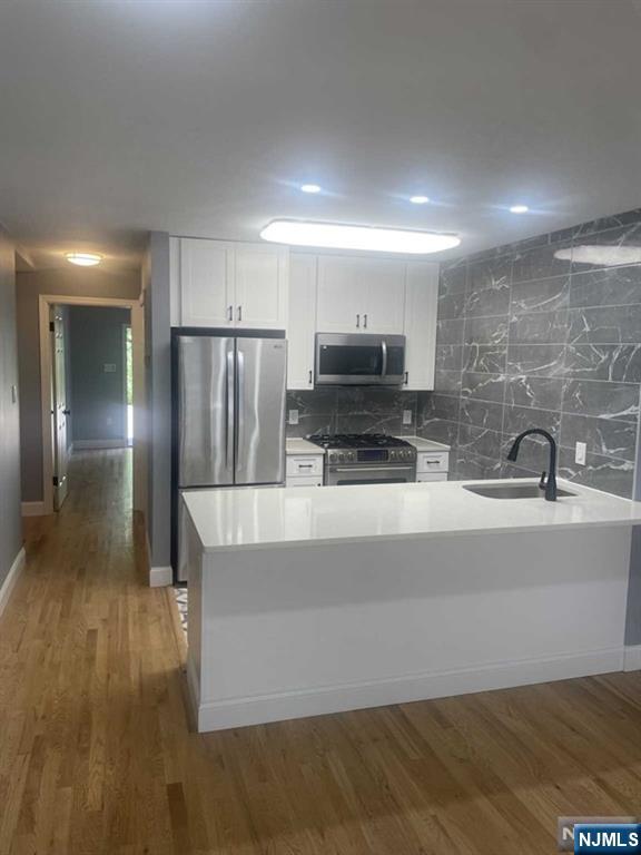 47 Ann Street, Unit 1 Paterson, NJ 07501 - Photo 4 of 20 a view of a kitchen with a sink