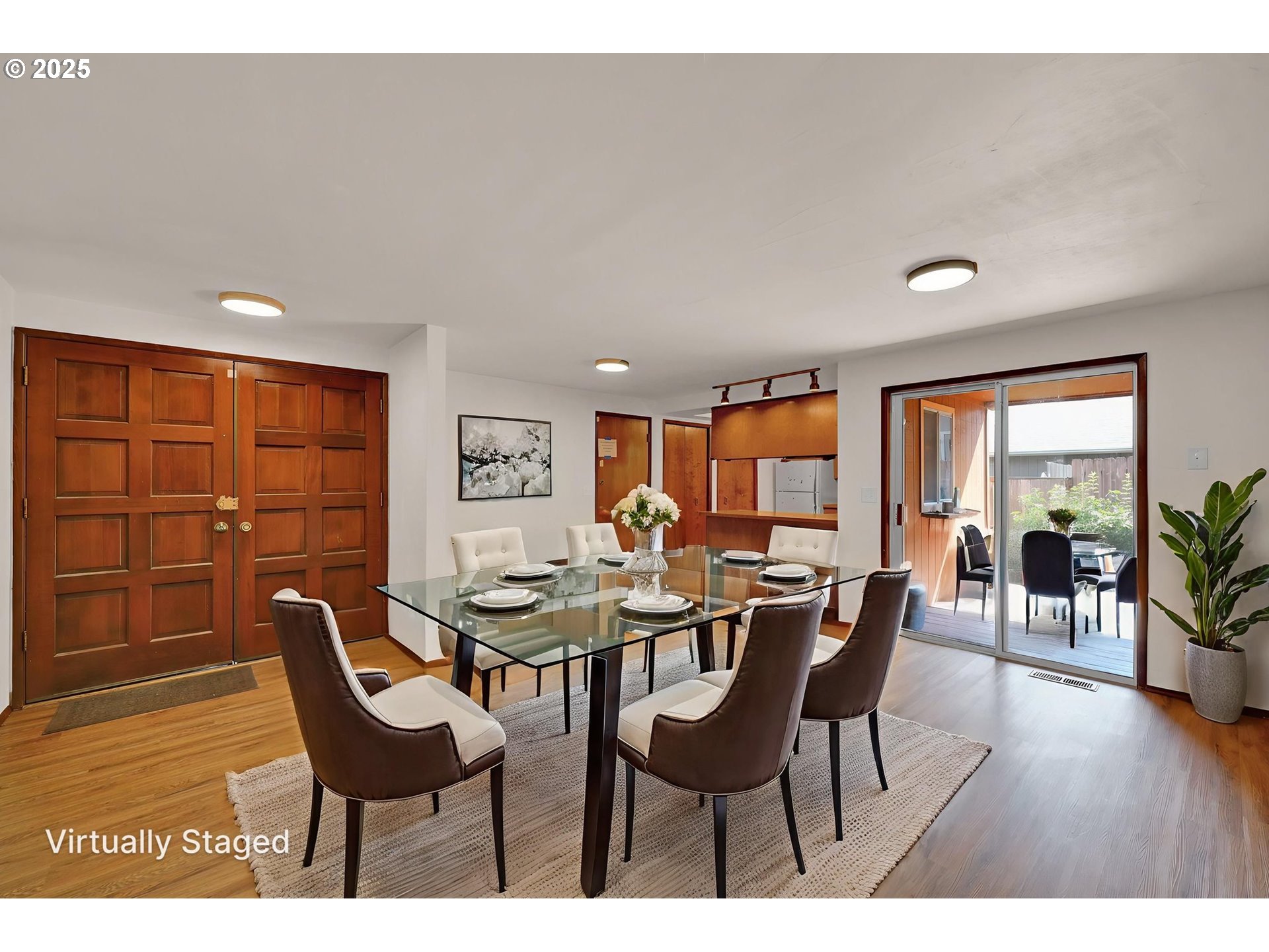 7087 Aster Street Springfield, OR 97478 - Photo 7 of 46 a view of a dining room with furniture and wooden floor