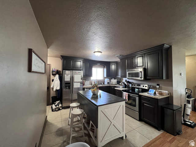 174 North 500 East Logan, UT 84321 - Photo 29 of 32 Main Level Kitchen
