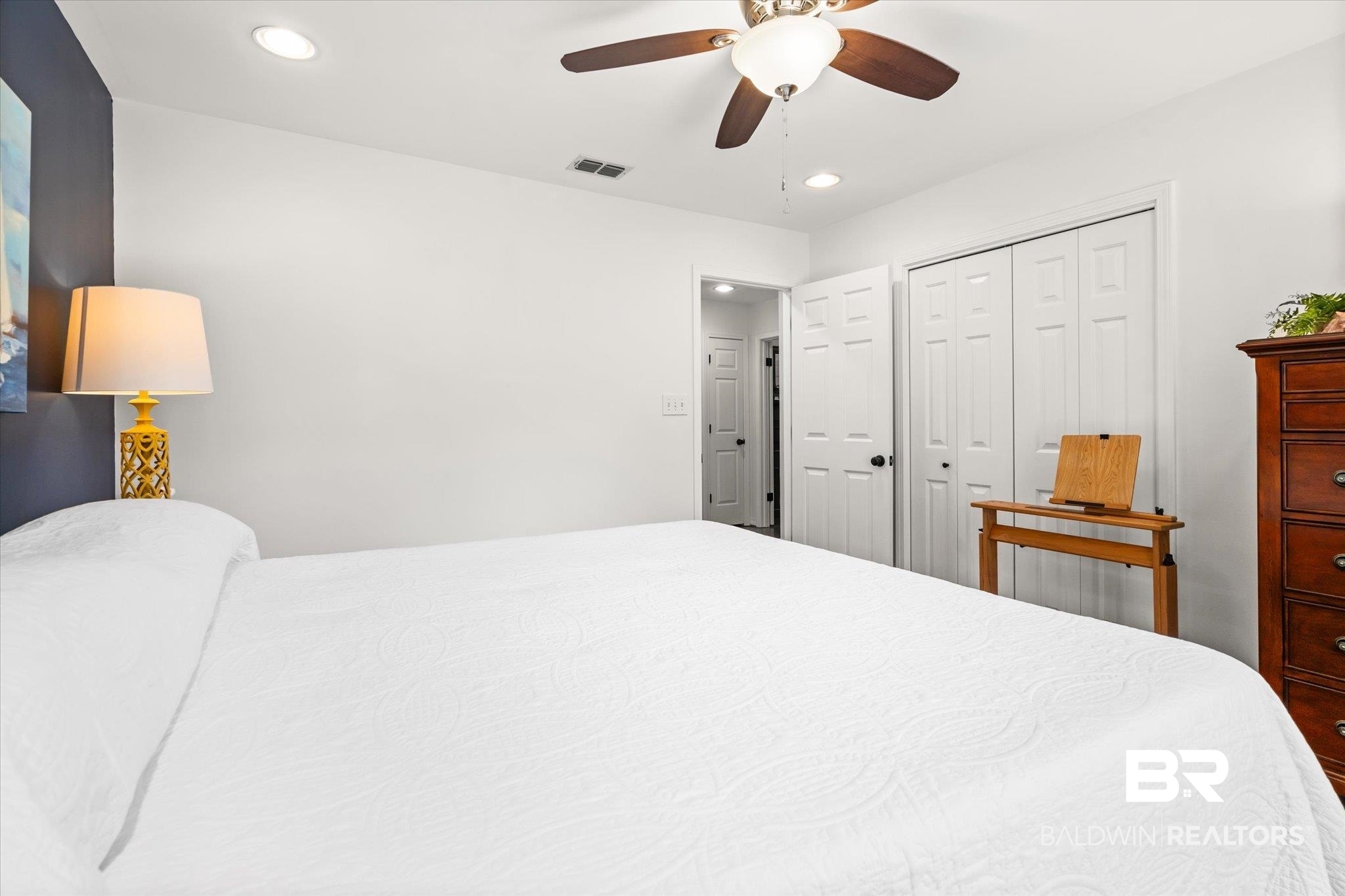 19924 Hunters Loop Fairhope, AL 36532 - Photo 25 of 40 Bedroom with a closet and ceiling fan