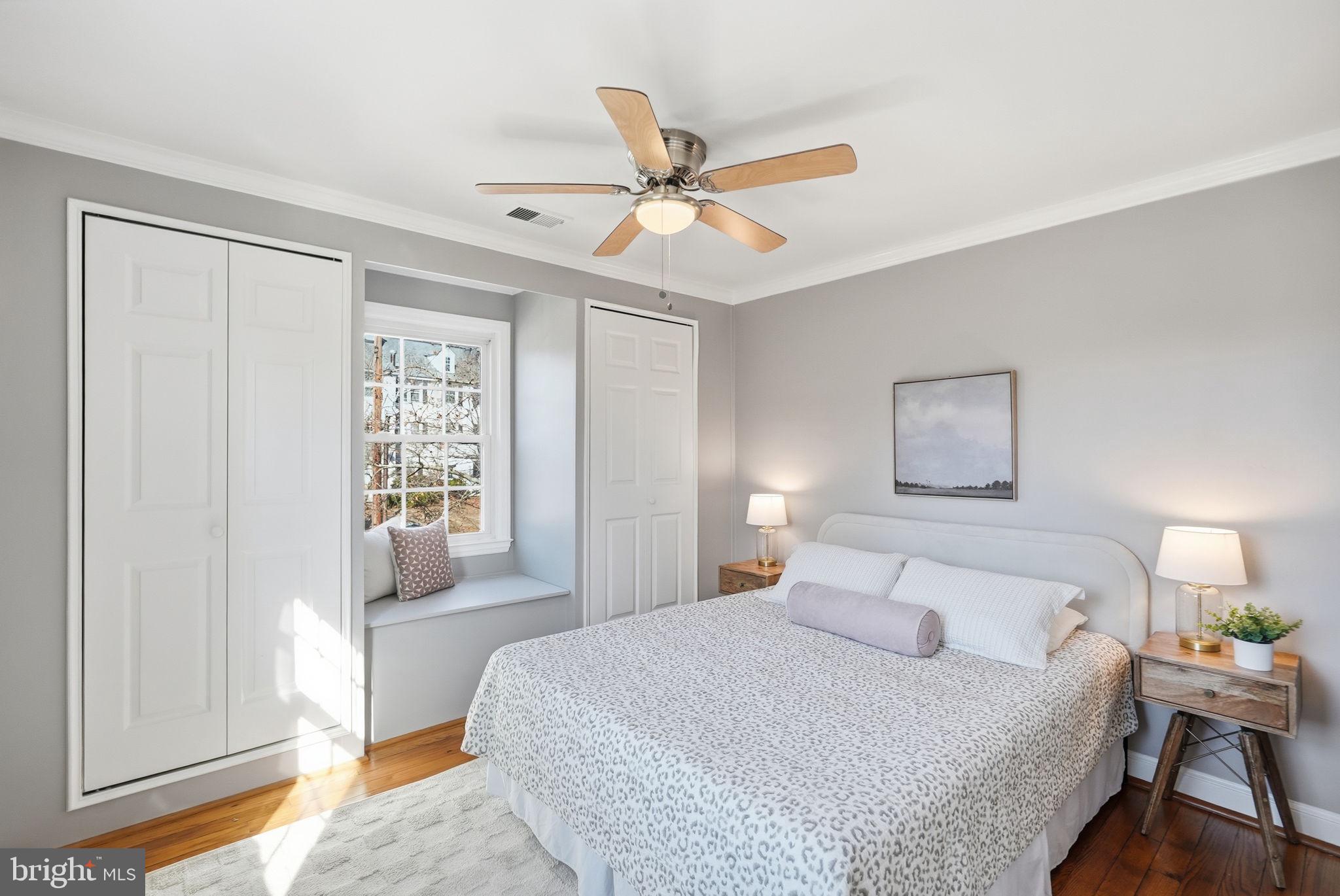 2900 13th Road South, Unit 201 Arlington, VA 22204 - Photo 18 of 32 a bedroom with a bed and a window