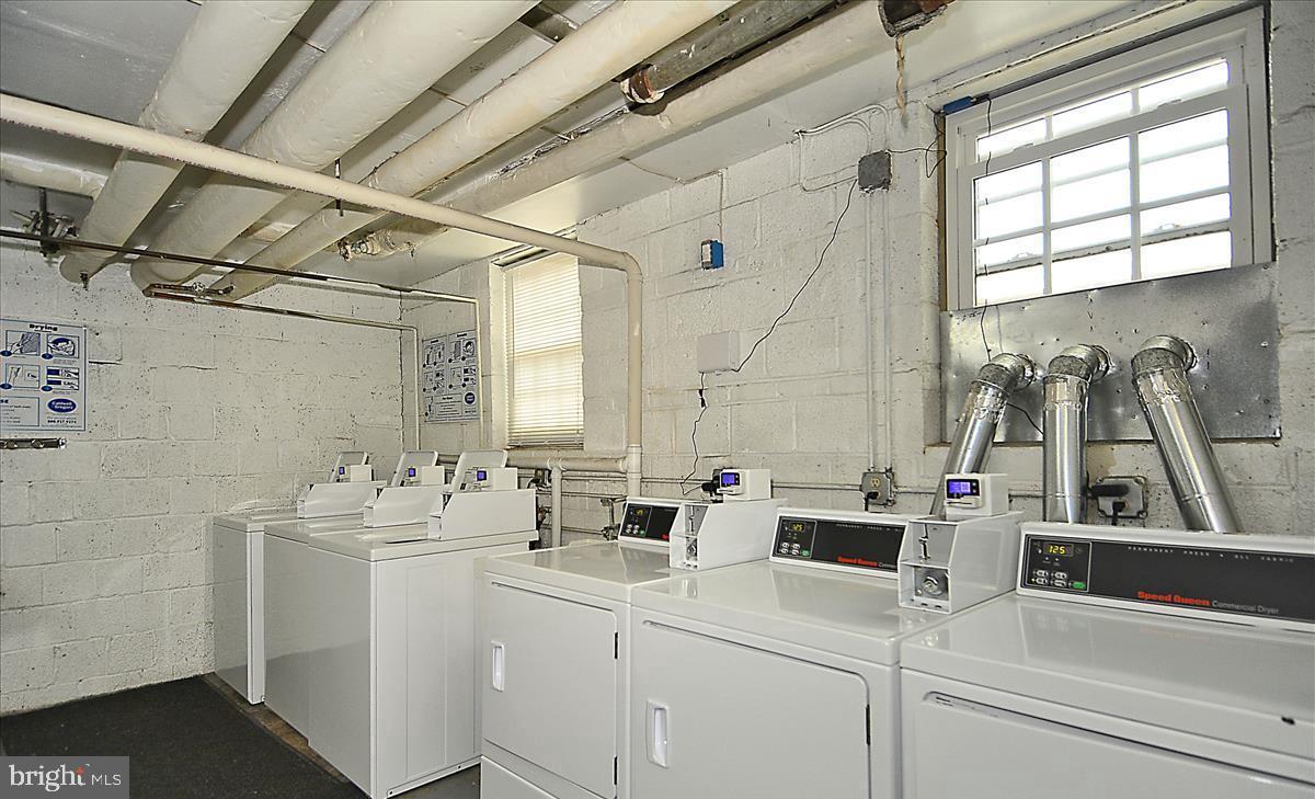 2900 13th Road South, Unit 201 Arlington, VA 22204 - Photo 28 of 32 a utility room with dryer and washer