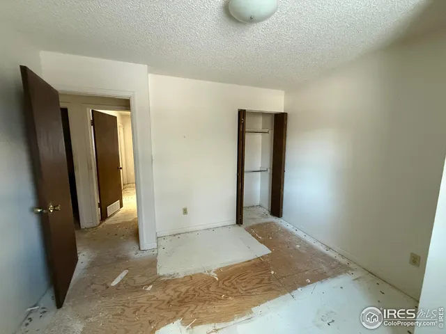 an empty room with mirror