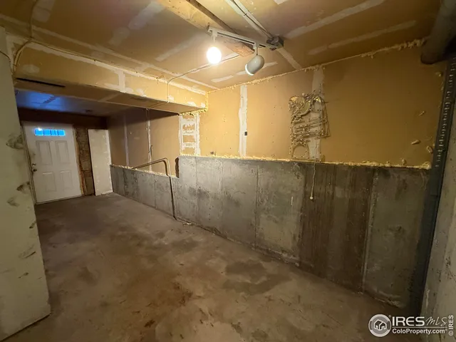 a view of a hallway with the wooden floor