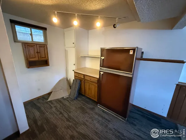 a bathroom with a sink and shower