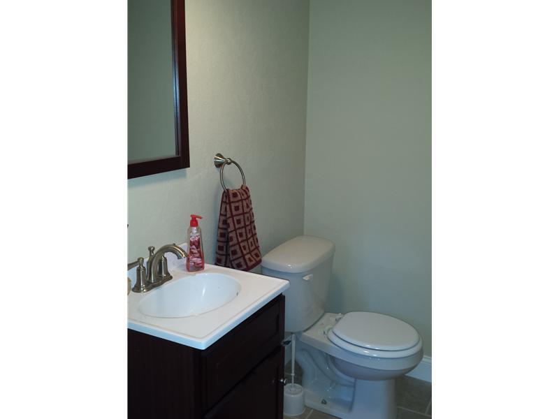 125 Johnetta Road Vandergrift, PA 15690 - Photo 18 of 20 Partial Bath. Partial Bath located beside Family Room. New Fixtures, Paint and Tile flooring