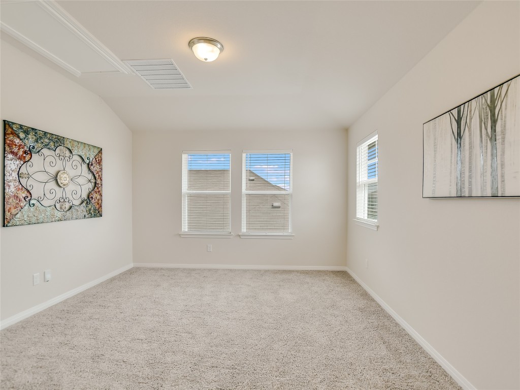 2818 Rustic Hills Drive Round Rock, TX 78665 - Photo 17 of 26 an empty room with a window