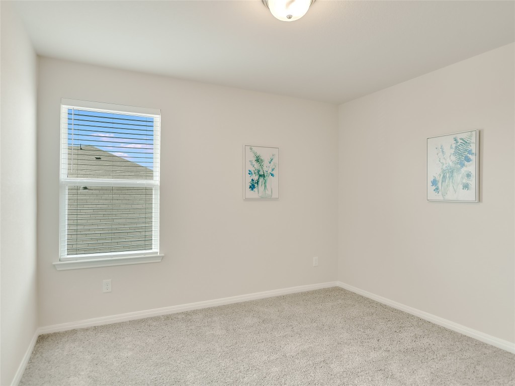 2818 Rustic Hills Drive Round Rock, TX 78665 - Photo 18 of 26 an empty room with a window