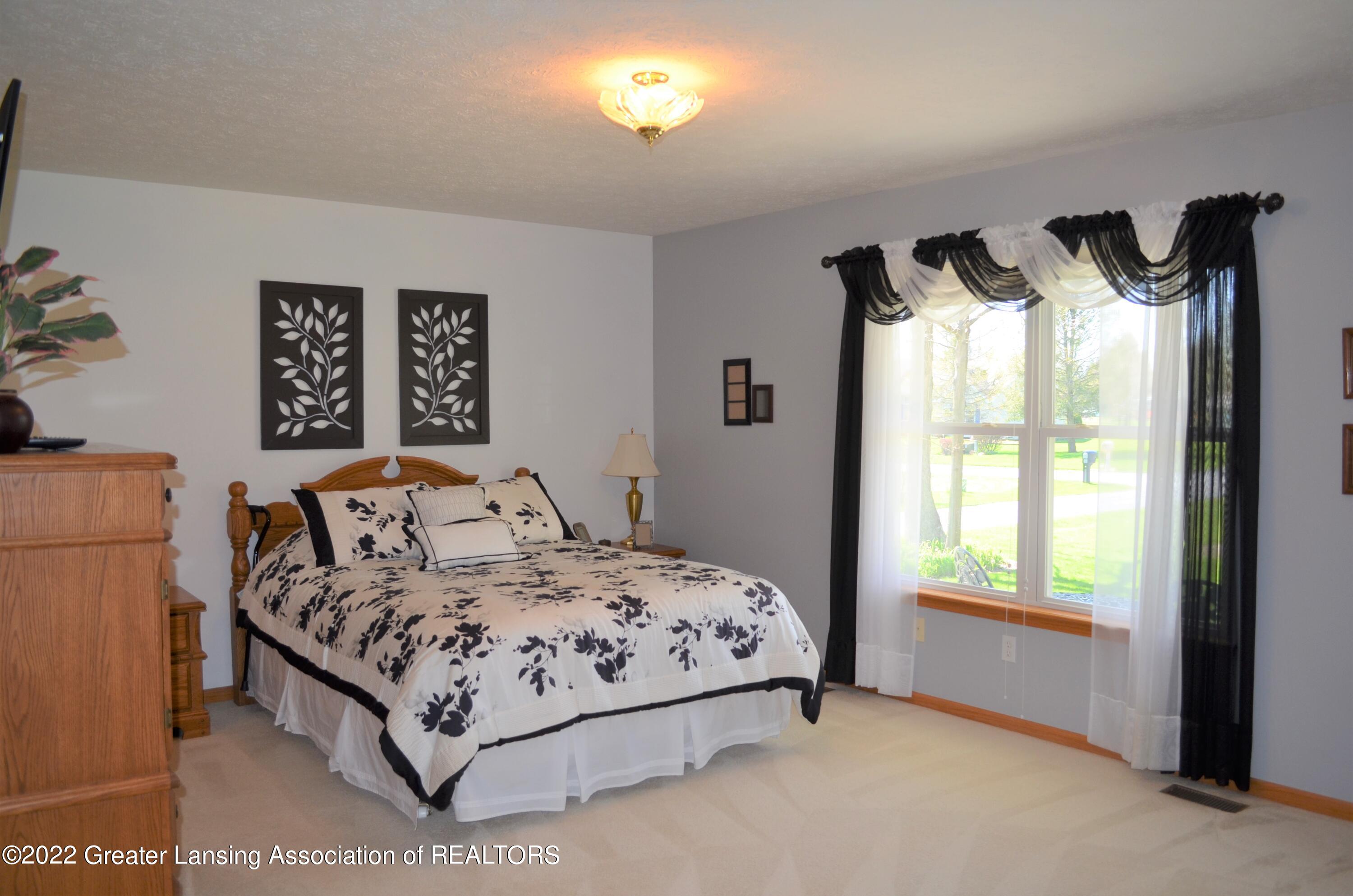 10833 Mack In Aw Trail Fowlerville, MI 48836 - Photo 14 of 59 Primary Bedroom
