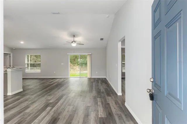 a kitchen with stainless steel appliances granite countertop a sink stove oven and refrigerator