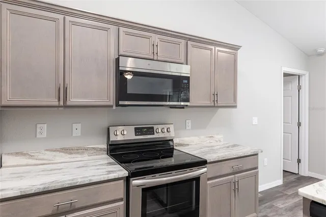 a bathroom with a shower and toilet