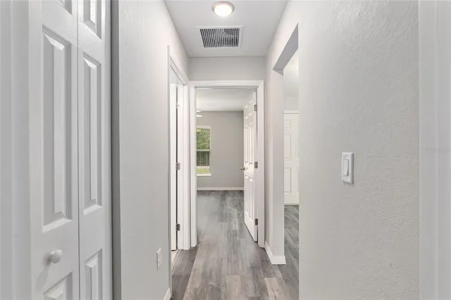 a big house with swimming pool in front of it