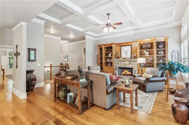a spacious bathroom with a granite countertop double vanity sink and a mirror