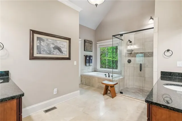a view of a balcony with furniture and wooden floor
