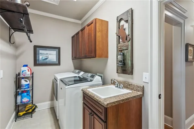 a en suite bathroom with a double vanity sink a mirror and shower