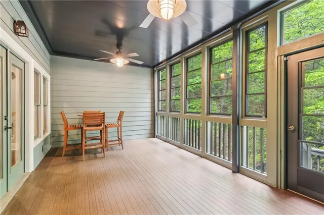 a view of a swimming pool with an outdoor seating and yard