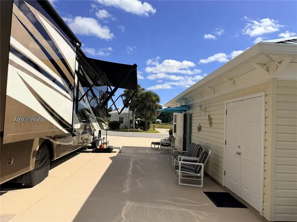 a view of a hall with the floor and dining room