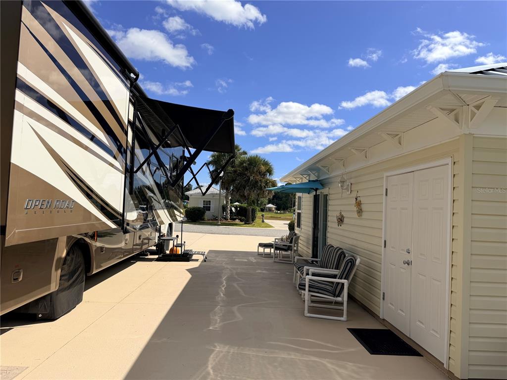 9594 Southeast 47th Way Webster, FL 33597 - Photo 11 of 50 a view of a hall with the floor and dining room