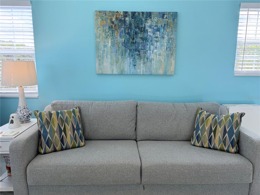 9594 Southeast 47th Way Webster, FL 33597 - Photo 23 of 50 a living room with a couch