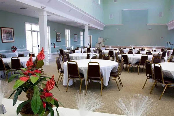 a group of people sitting at living room
