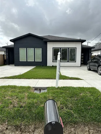 a house view with a garden space