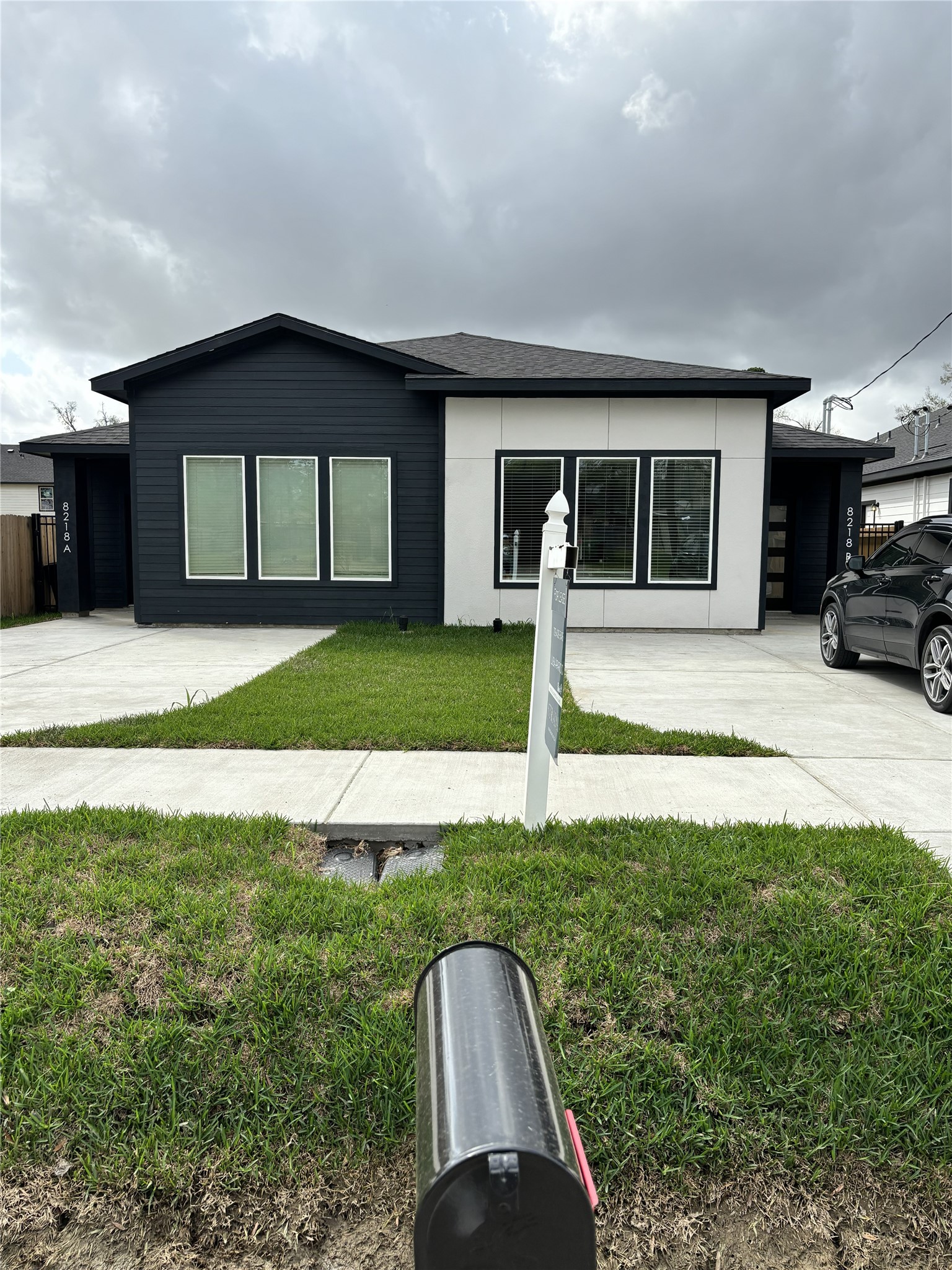 a house view with a garden space