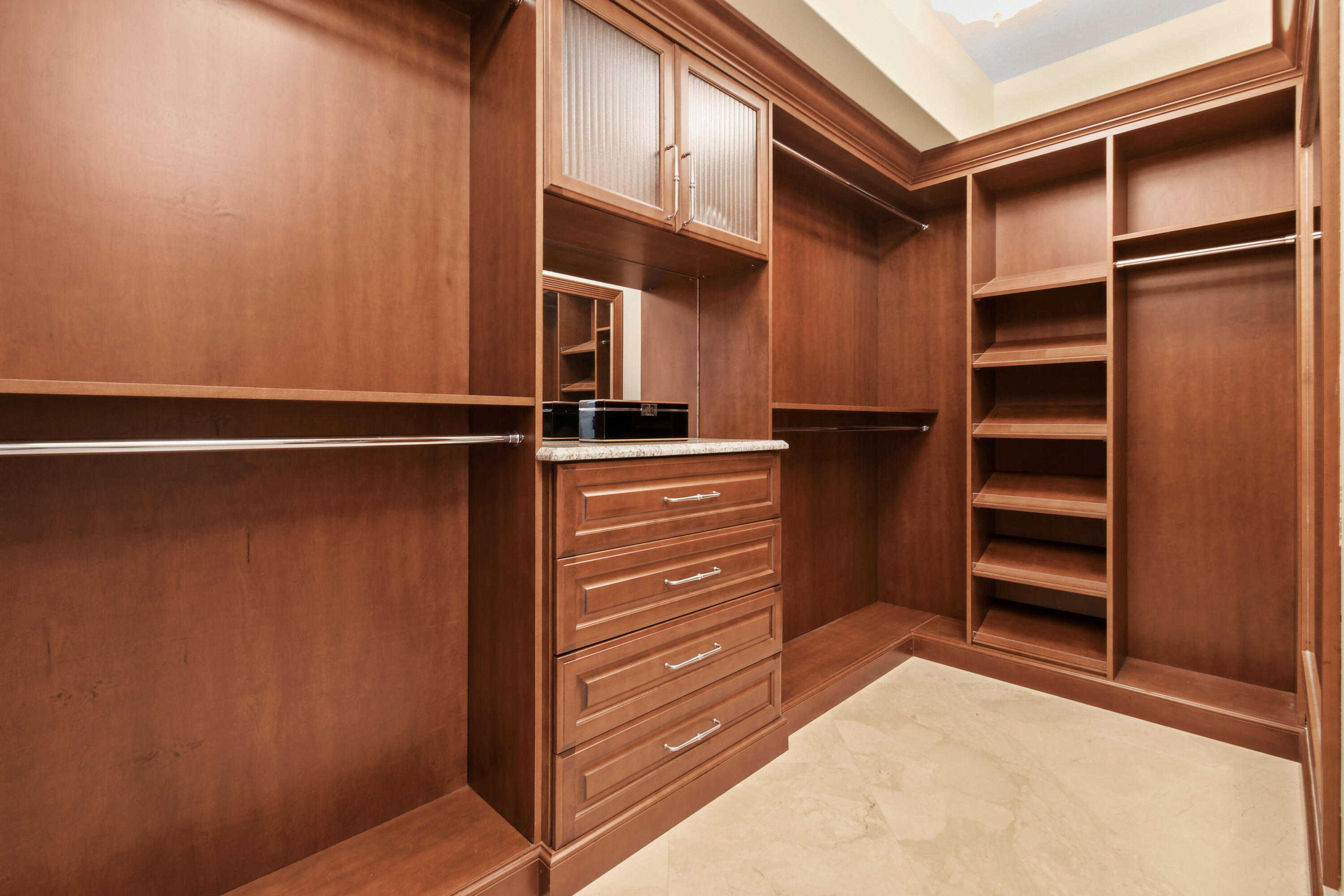 5050 North Ocean Drive, Unit 702 Singer Island, FL 33404 - Photo 15 of 40 a view of walk in closet with empty racks
