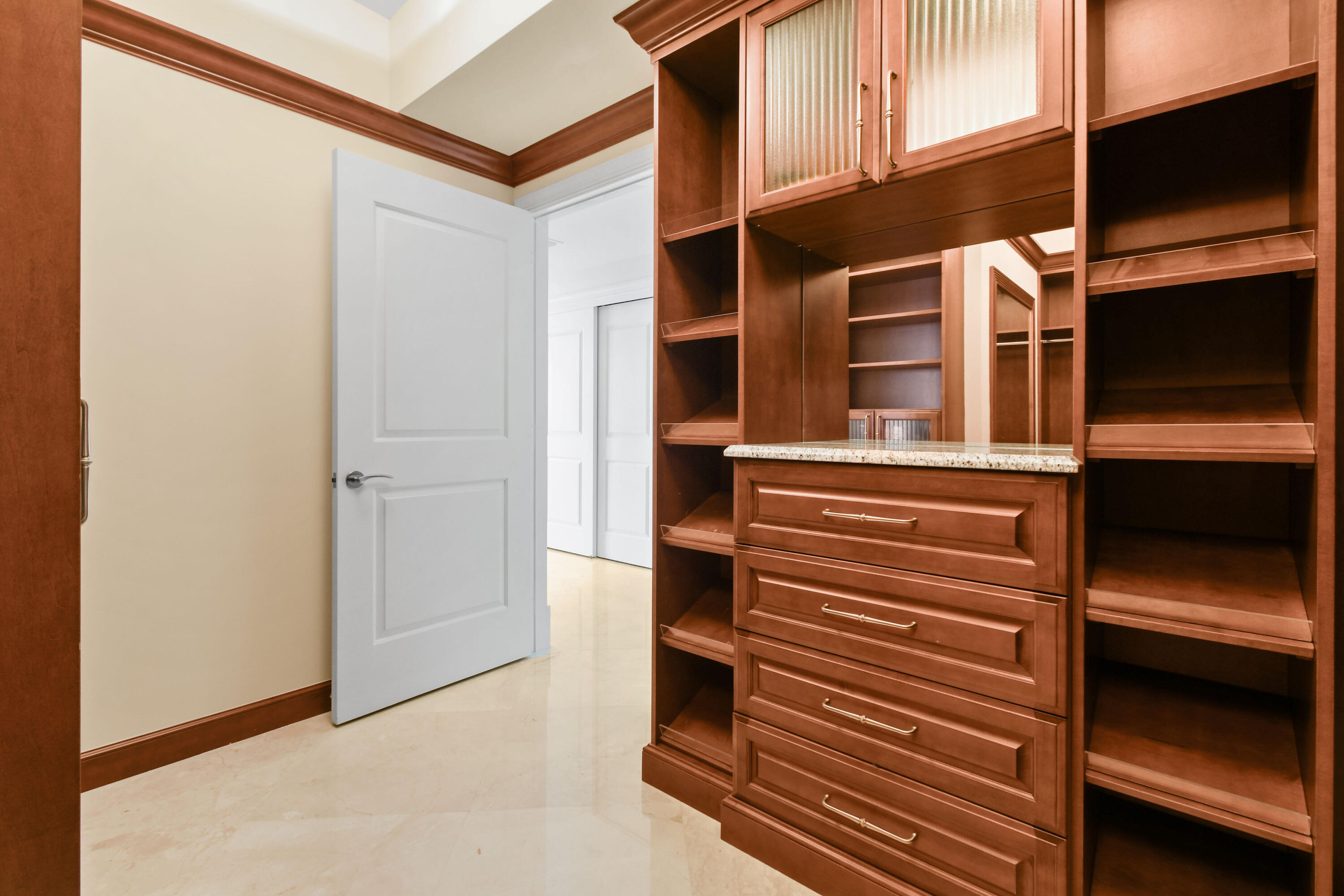 5050 North Ocean Drive, Unit 702 Singer Island, FL 33404 - Photo 16 of 40 a view of walk in closet