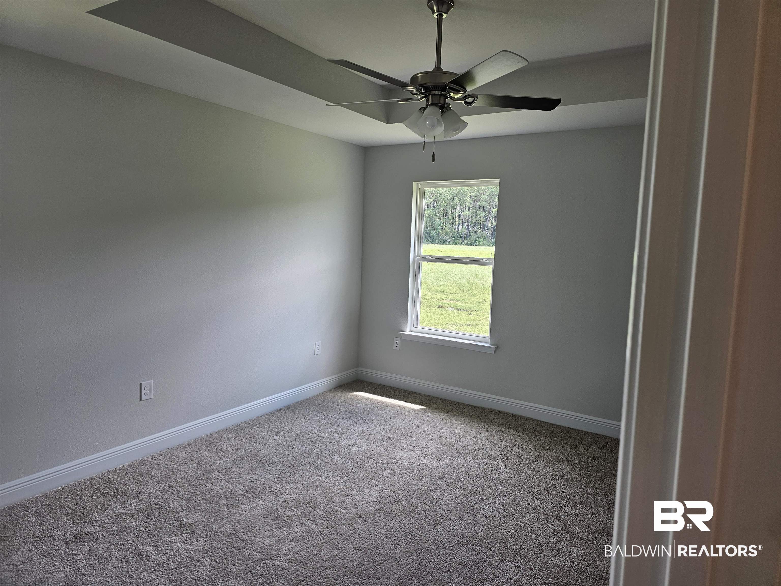 650 Revere Street Foley, AL 36535 - Photo 33 of 34 Carpeted empty room featuring ceiling fan