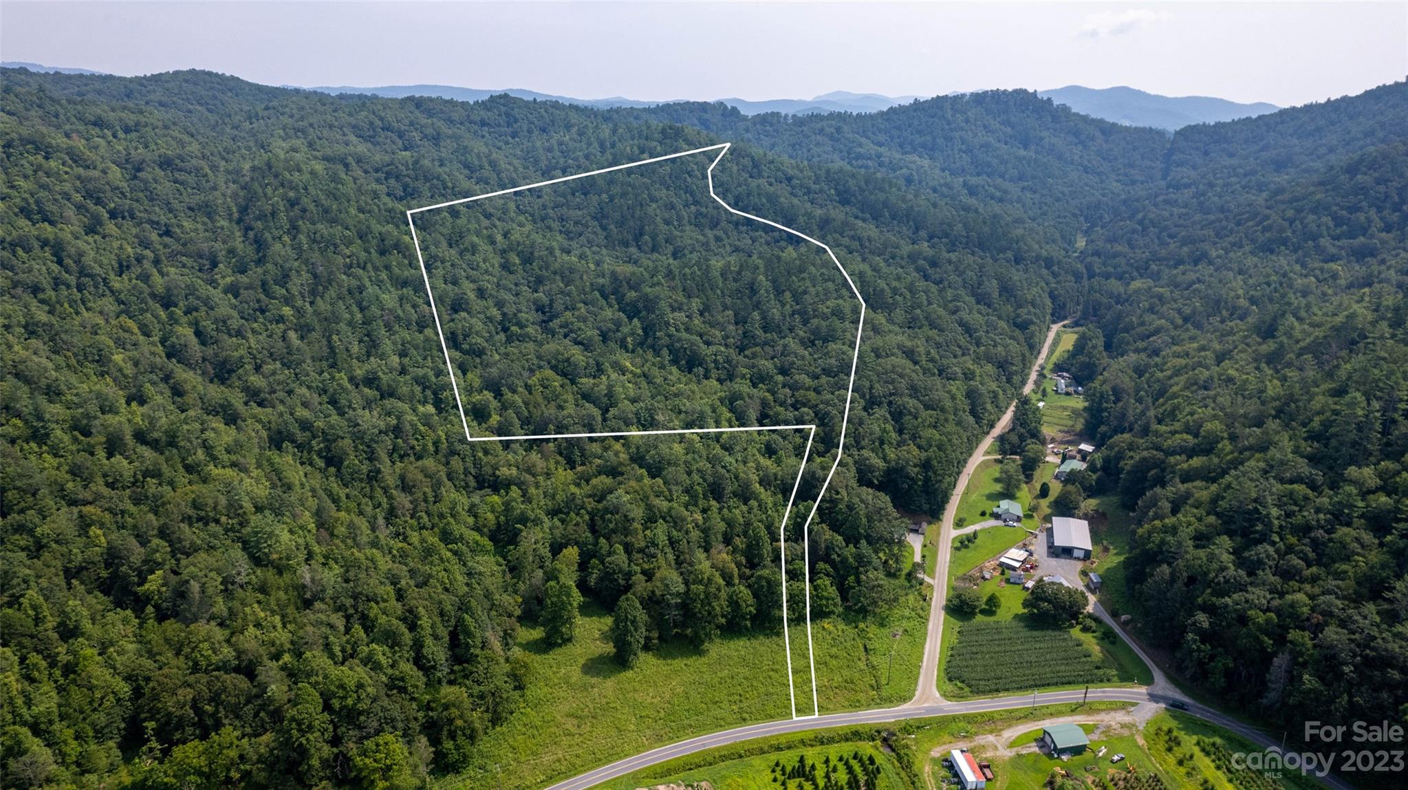 Tbd Tbd Collettsville Road, Unit 19 Lenoir, NC 28645 - Photo 2 of 16 a view of a field with a tree in the background