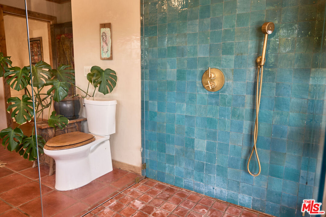 22068 Topanga School Road Topanga, CA 90290 - Photo 26 of 70 a bathroom with a toilet sink and shower