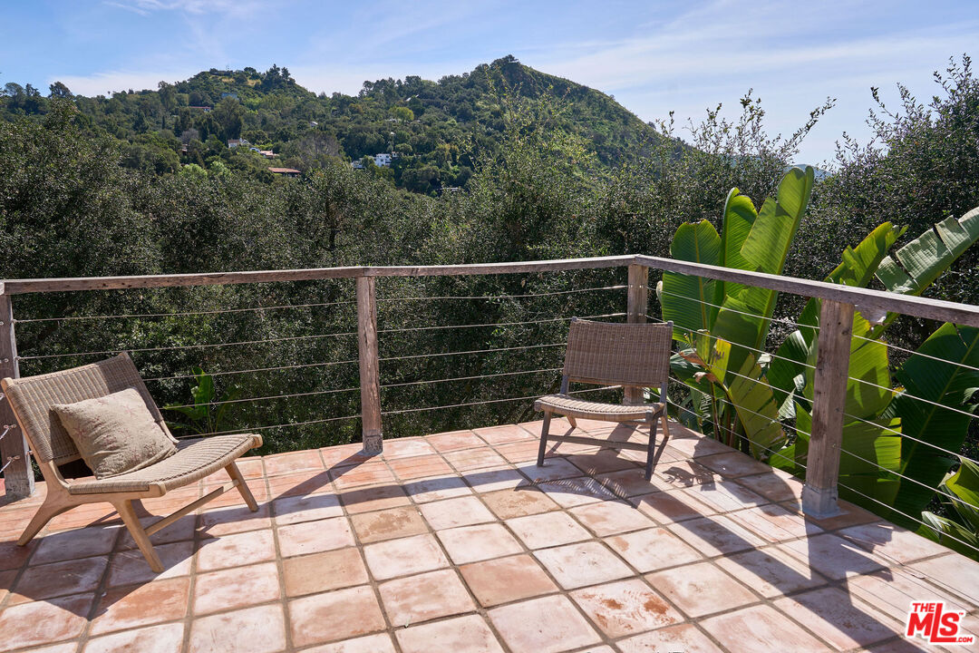 22068 Topanga School Road Topanga, CA 90290 - Photo 29 of 70 a view of balcony with wooden floor and outdoor seating