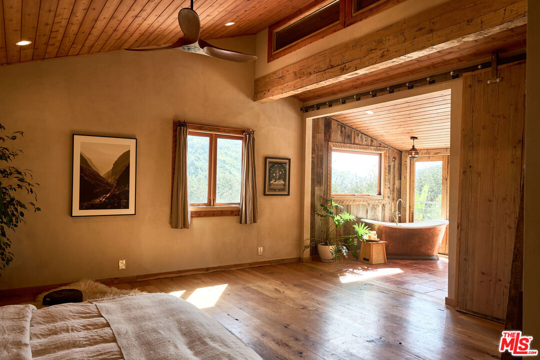22068 Topanga School Road Topanga, CA 90290 - Photo 43 of 70 a view of livingroom with furniture and windows