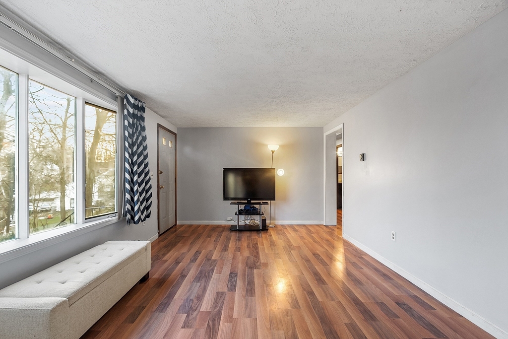 5 Catherine Street Clinton, MA 01510 - Photo 12 of 29 a view of a room with wooden floor and windows
