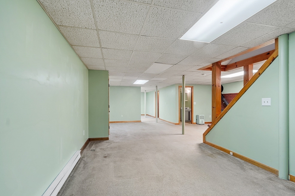 5 Catherine Street Clinton, MA 01510 - Photo 22 of 29 a view of an empty room with stairs