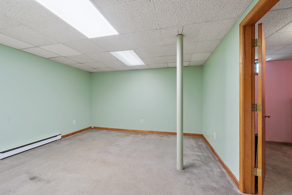 5 Catherine Street Clinton, MA 01510 - Photo 23 of 29 an empty room with windows