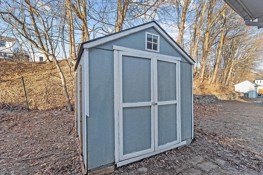 5 Catherine Street Clinton, MA 01510 - Photo 28 of 29 a view of a house with a yard