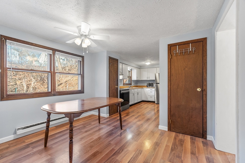 5 Catherine Street Clinton, MA 01510 - Photo 8 of 29 a view of a livingroom with furniture window and wooden floor