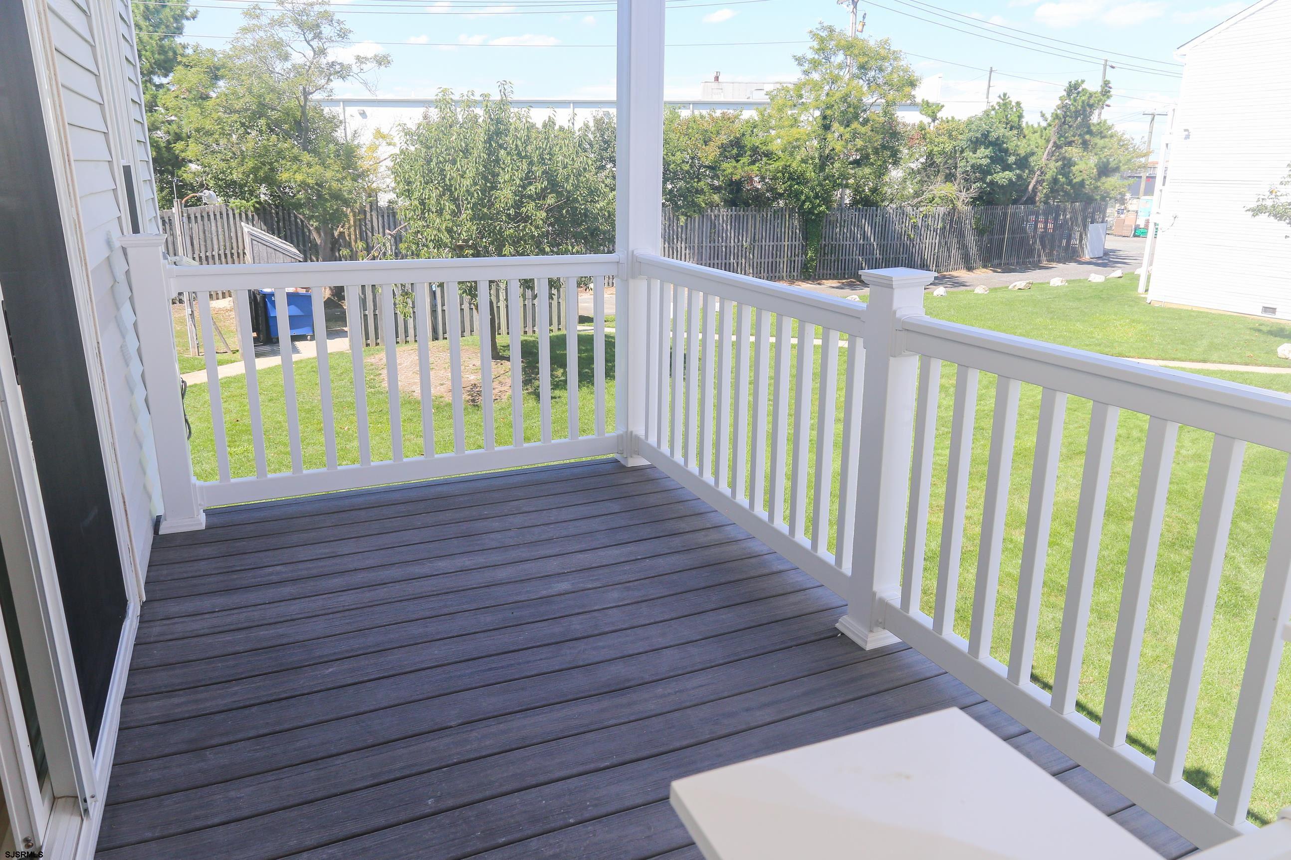 169 40th Street South, Unit 38 Brigantine, NJ 08203 - Photo 45 of 79 a view of a wooden deck