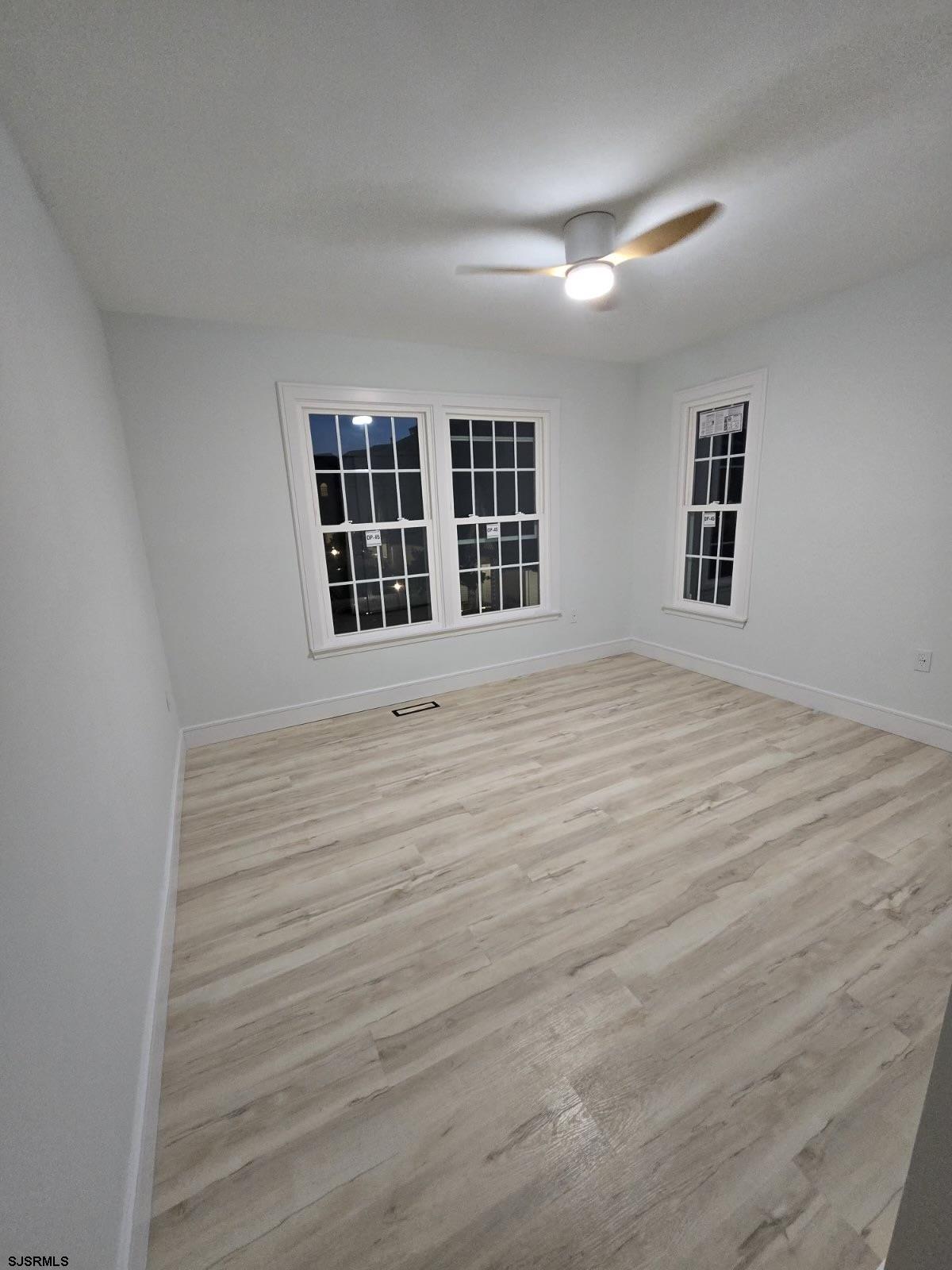 169 40th Street South, Unit 38 Brigantine, NJ 08203 - Photo 57 of 79 a view of an empty room with a window