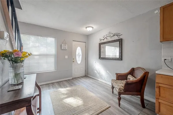a workspace with furniture and a potted plant