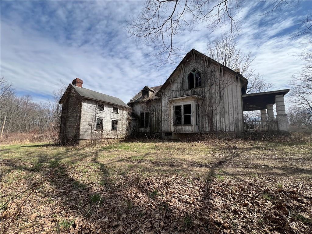 4905 Old Rte 422 New Castle, PA 16101 - Photo 2 of 16 a barn with a large window and large tree