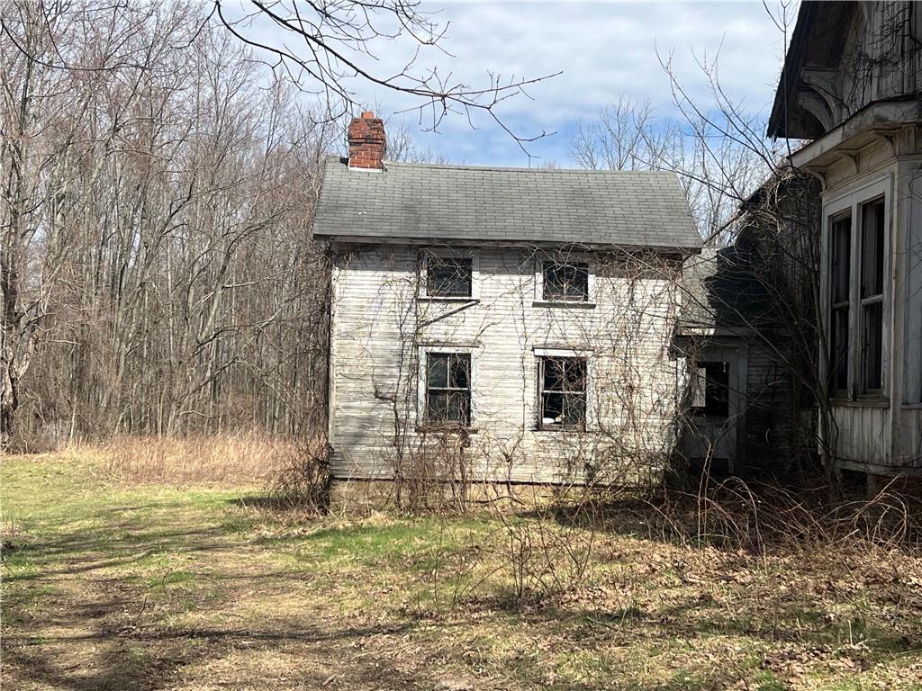 4905 Old Rte 422 New Castle, PA 16101 - Photo 3 of 16 a front view of house with a garden