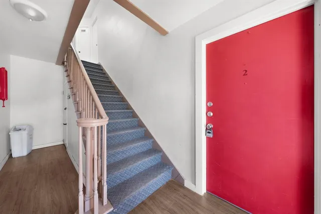 a view of a hallway with staircase