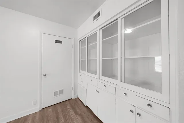 a view of an empty walk in closet