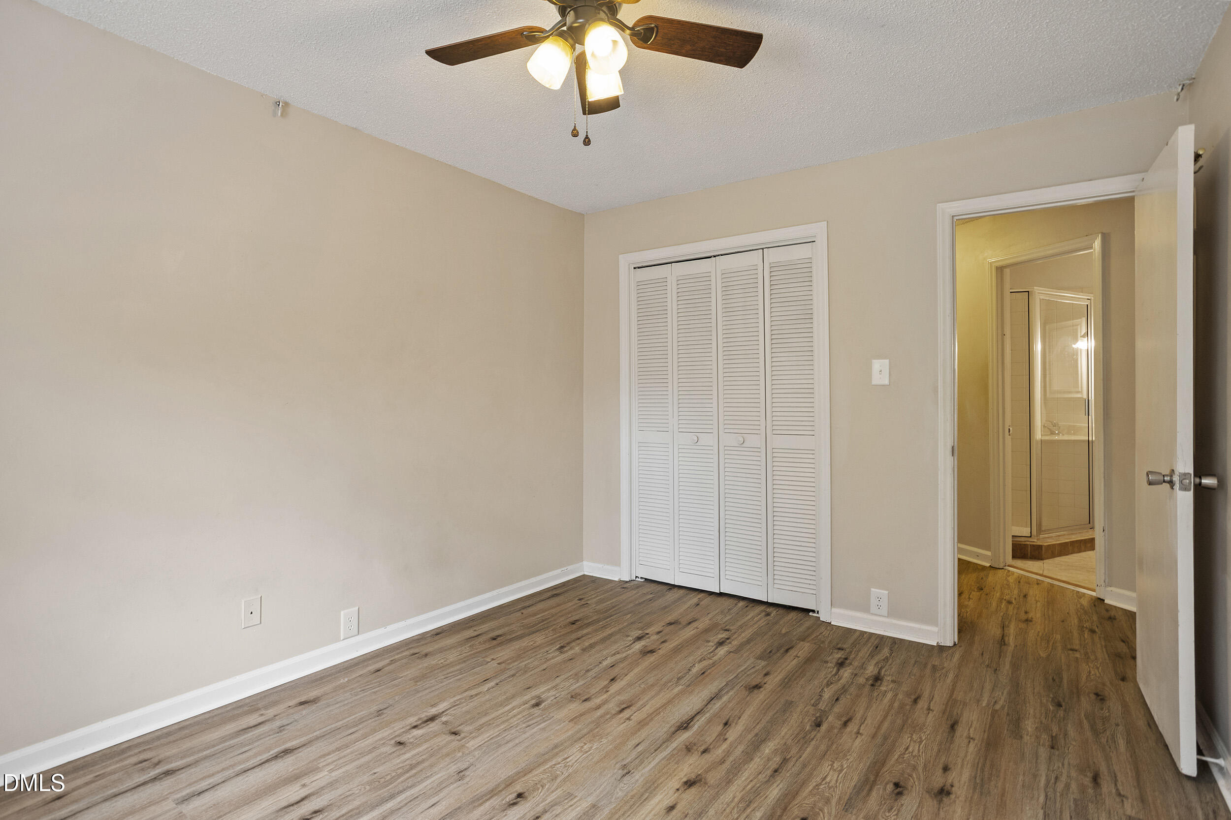 1801 Quail Ridge Road Raleigh, NC 27609 - Photo 21 of 29 wooden floor in an empty room with a window